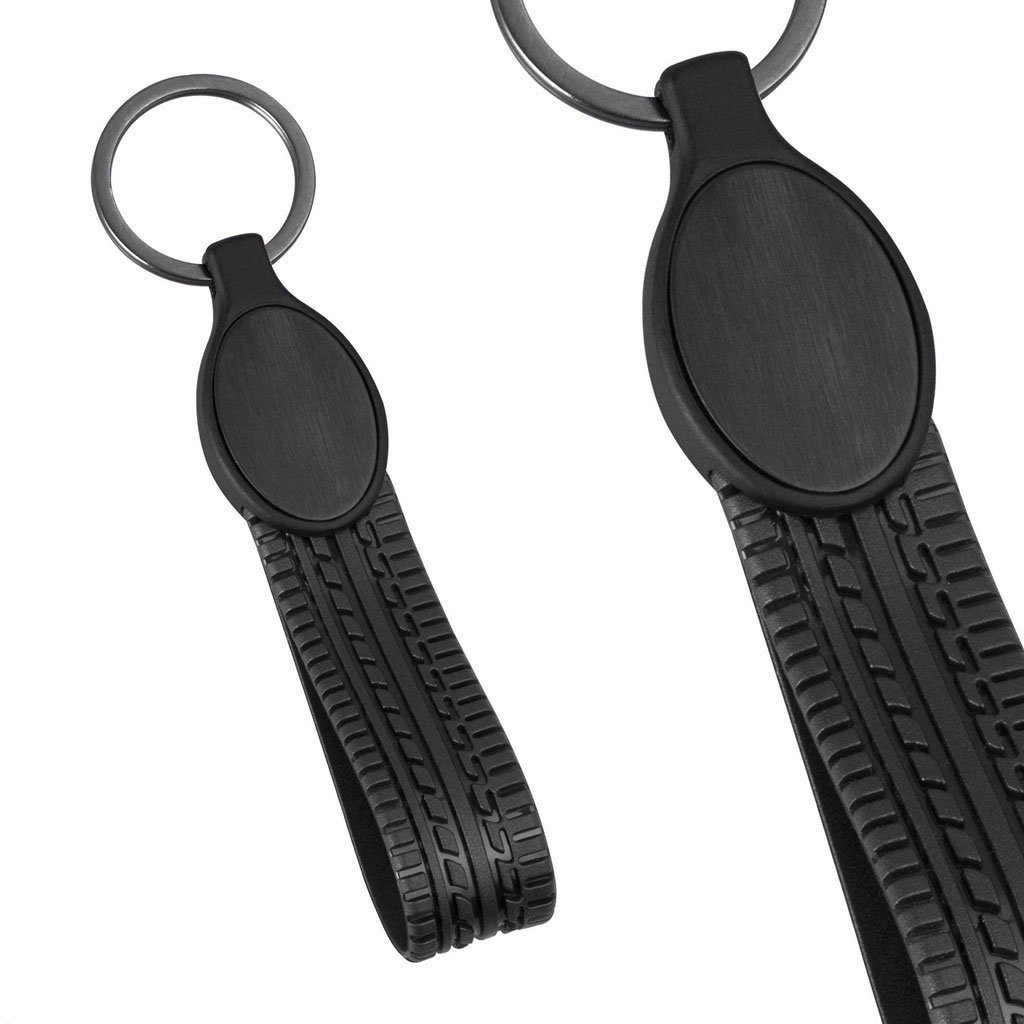 جاکلیدی چرمی مشکی دودی بیضی بند لاستیکی کد KL-128 - تصویر 1 جاکلیدی چرمی مشکی دودی بیضی بند لاستیکی کد KL-128 - تصویر 1